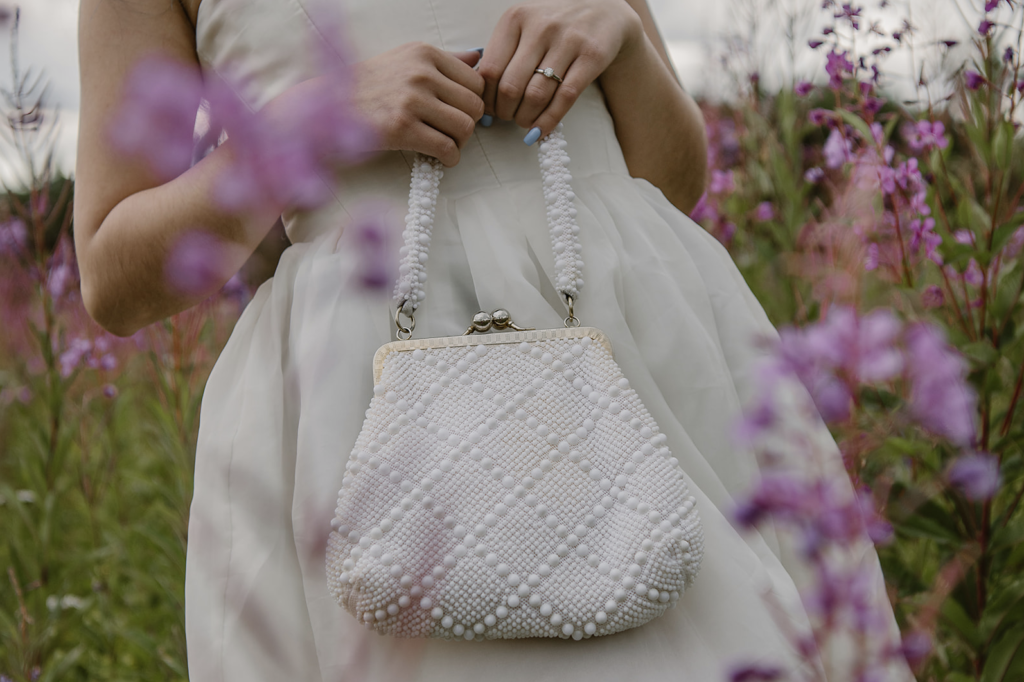 Pearl bridal purse in the fireweed available through Alaska Bridal Closet rentals.